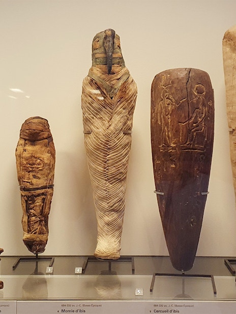 Ancient Egyptian artifacts displayed at the Louvre Museum in Paris, France.
