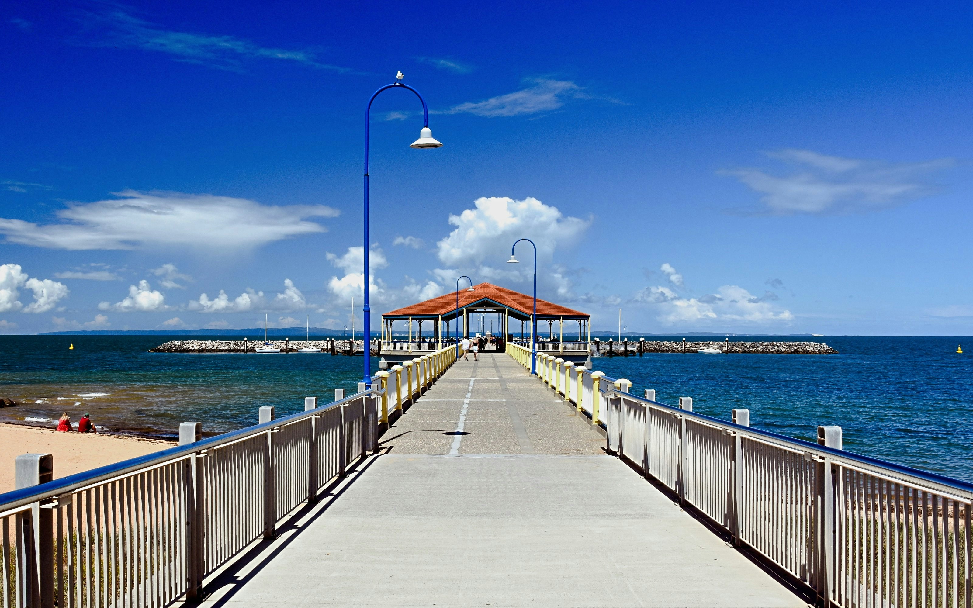 Redcliffe Jetty extending into the ocean on Moreton Island, Australia.