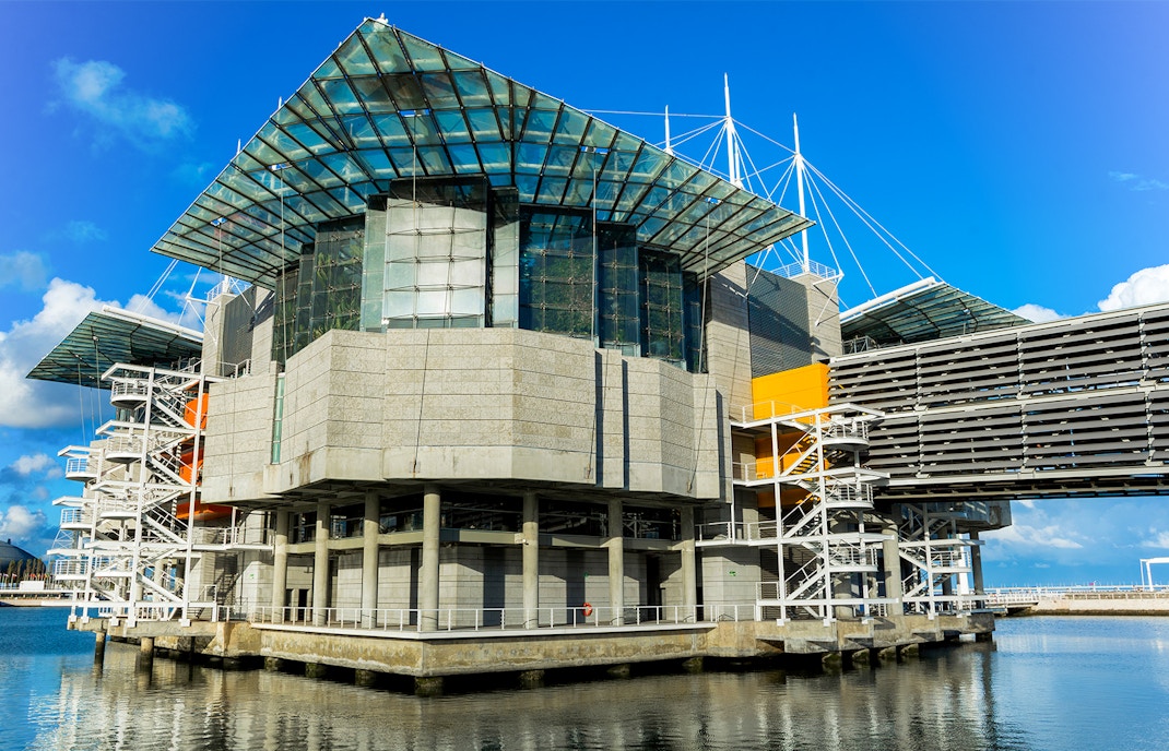 Lisbon Oceanarium's modern aquarium building with unique architectural design in Portugal.