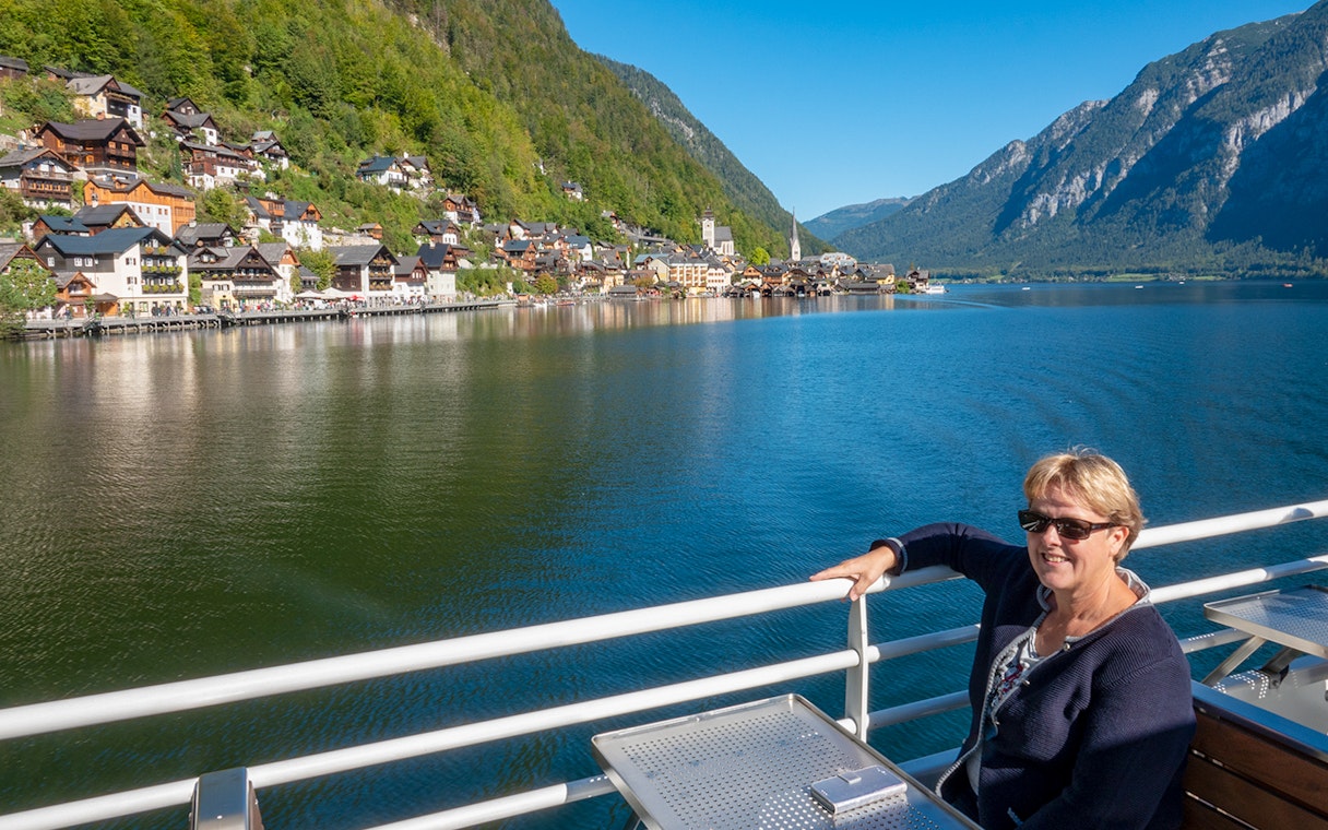 Boat ride view of Hallstatt village and lake on a day trip from Vienna.