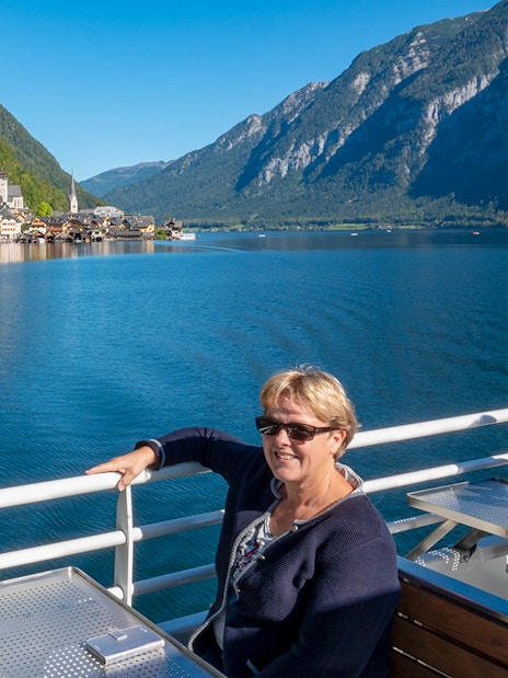 Boat ride view of Hallstatt village and lake on a day trip from Vienna.
