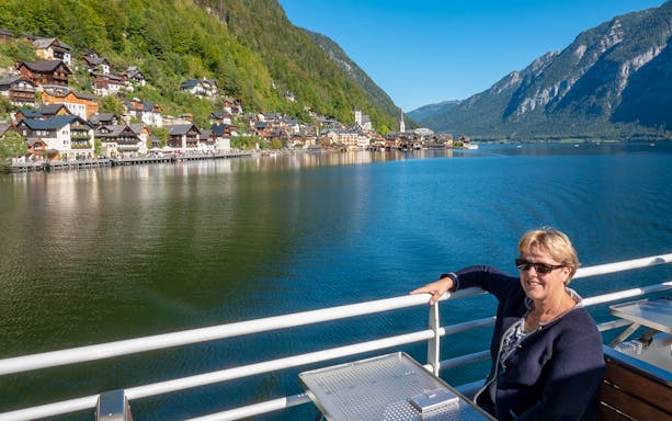 Boat ride view of Hallstatt village and lake on a day trip from Vienna.