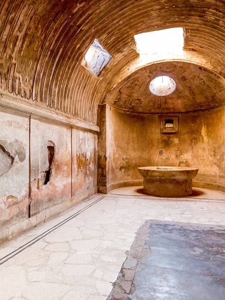 Ancient bathhouse interior in Pompeii on a 2-hour private guided tour.