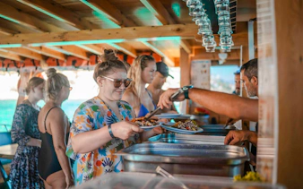 Guests serving lunch on Alanya Boat Day Tour.