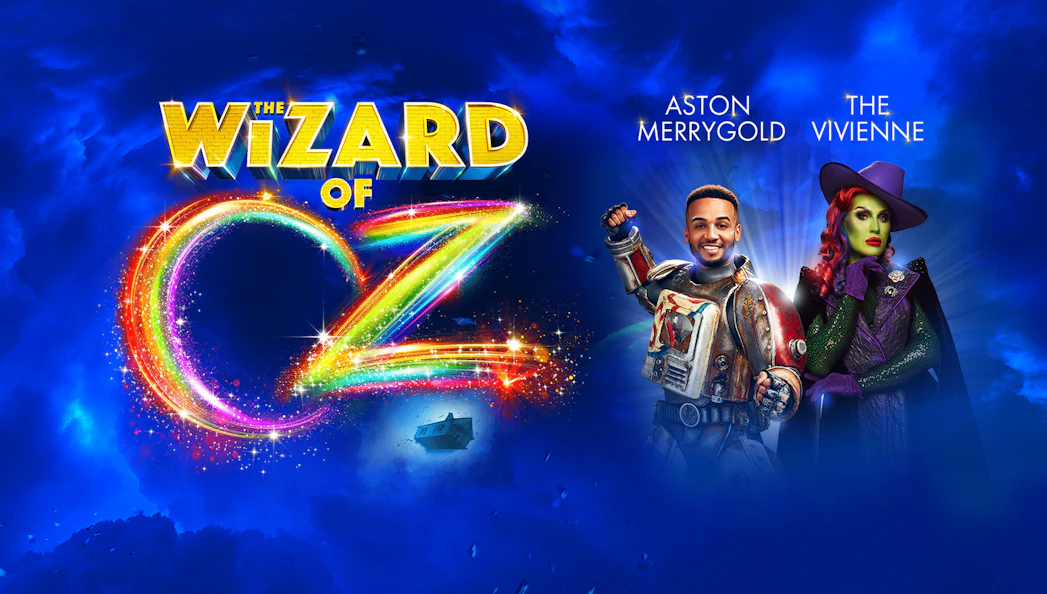 Wizard of Oz logo with two characters in colorful costumes against a blue sky background.