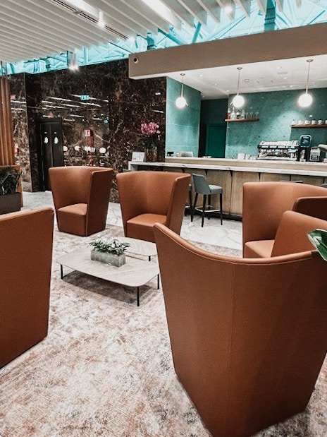 Lounge seating area at Plaza Premium First Lounge, Rome Fiumicino Airport Terminal 1.