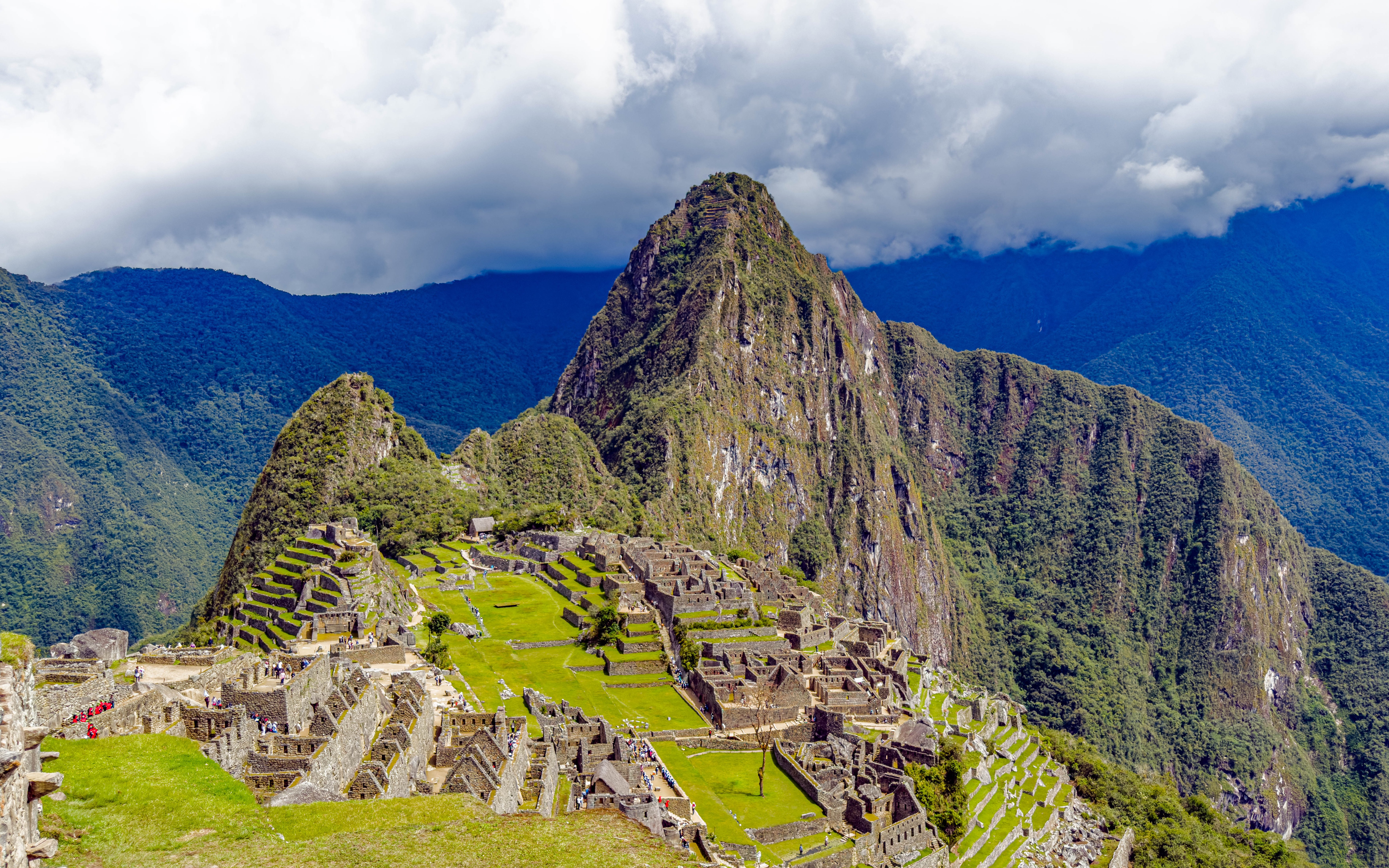Aerial view of Machu Picchu ruins with Huayna Picchu mountain in Peru.