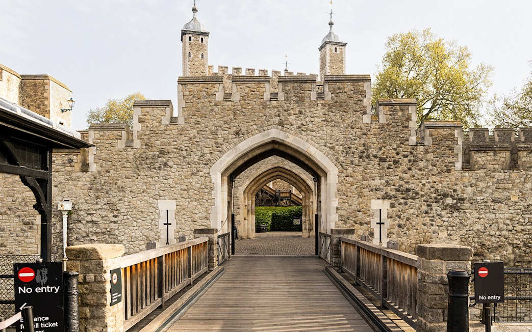 Entrance to the historic Tower of London, early morning tour setting.