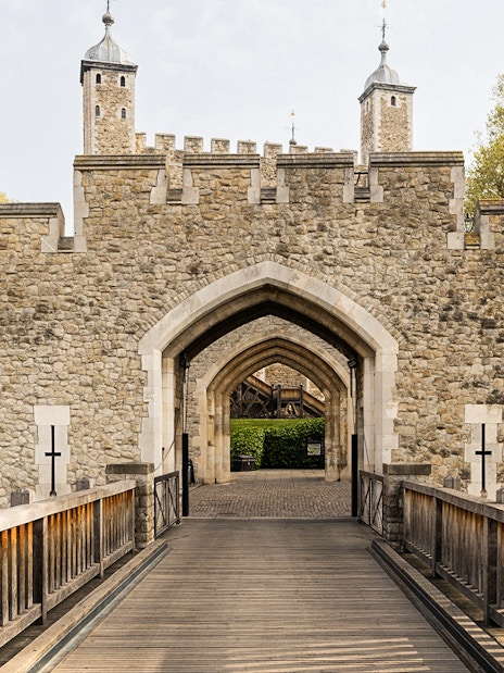 Entrance to the historic Tower of London, early morning tour setting.