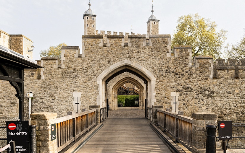 Entrance to the historic Tower of London, early morning tour setting.
