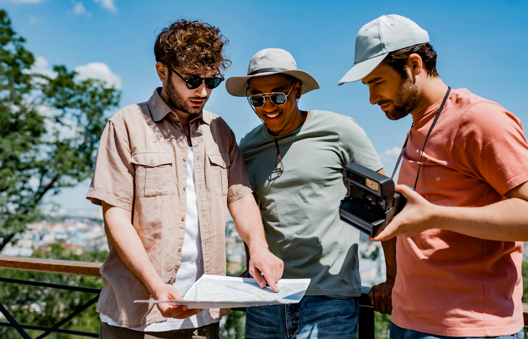 Tour guide explaining map to tourists during Toledo Monuments tour.