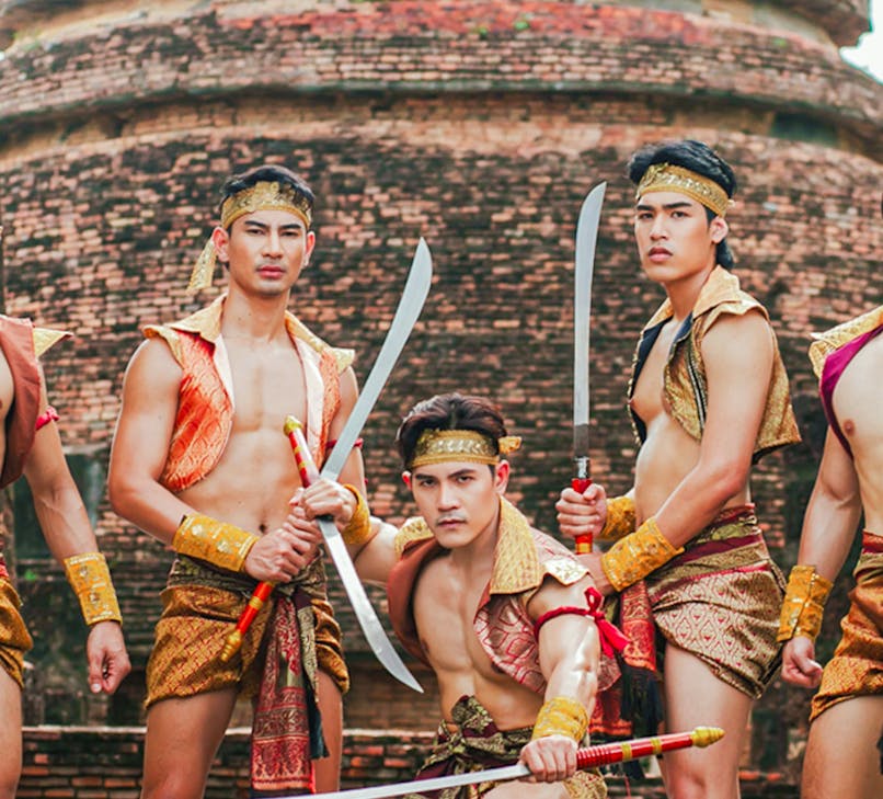 Siam Fantasy show performers in traditional Thai costumes on stage, Bangkok.