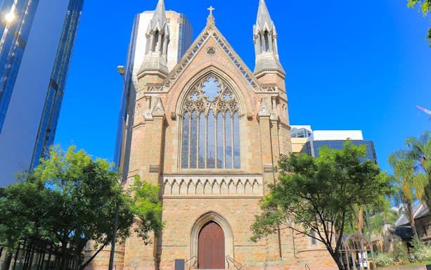 Gothic-style church facade on Brisbane walking tour.
