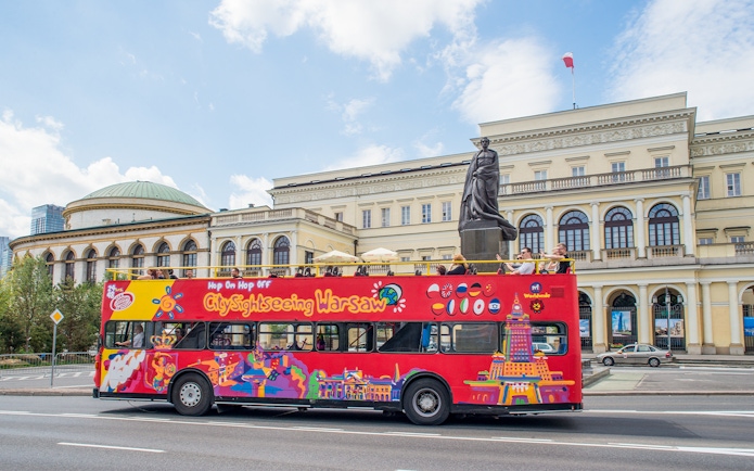 City sightseeing bus in front of the Palace of Minister of Treasure, Warsaw.
