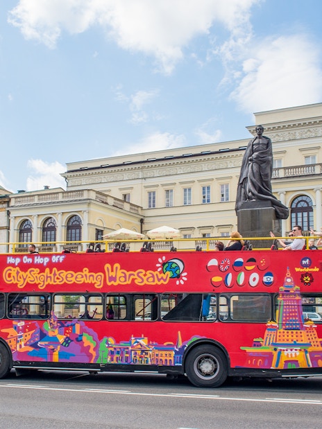 City sightseeing bus in front of the Palace of Minister of Treasure, Warsaw.