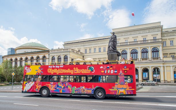 City sightseeing bus in front of the Palace of Minister of Treasure, Warsaw.