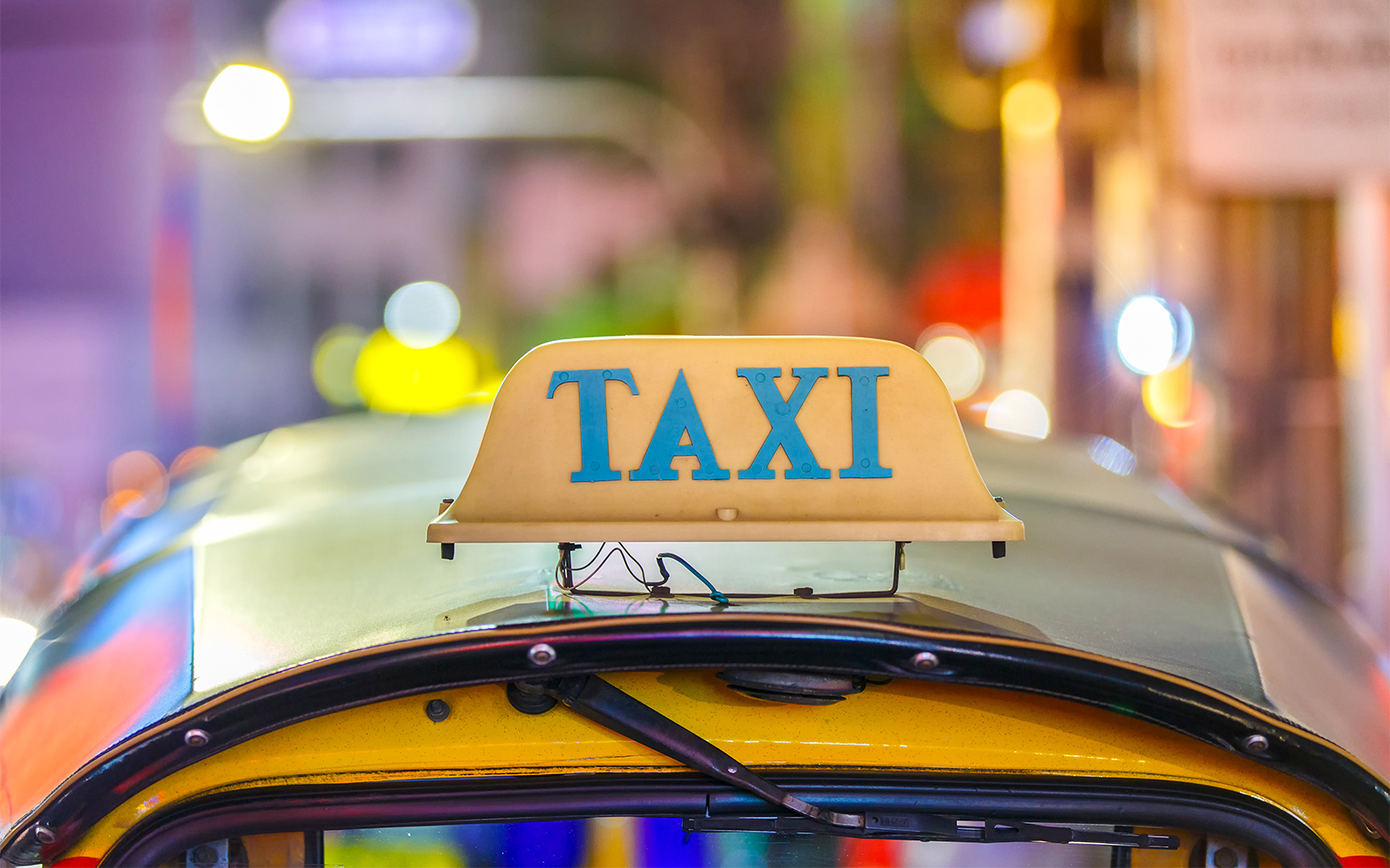 Taxi at night at bay