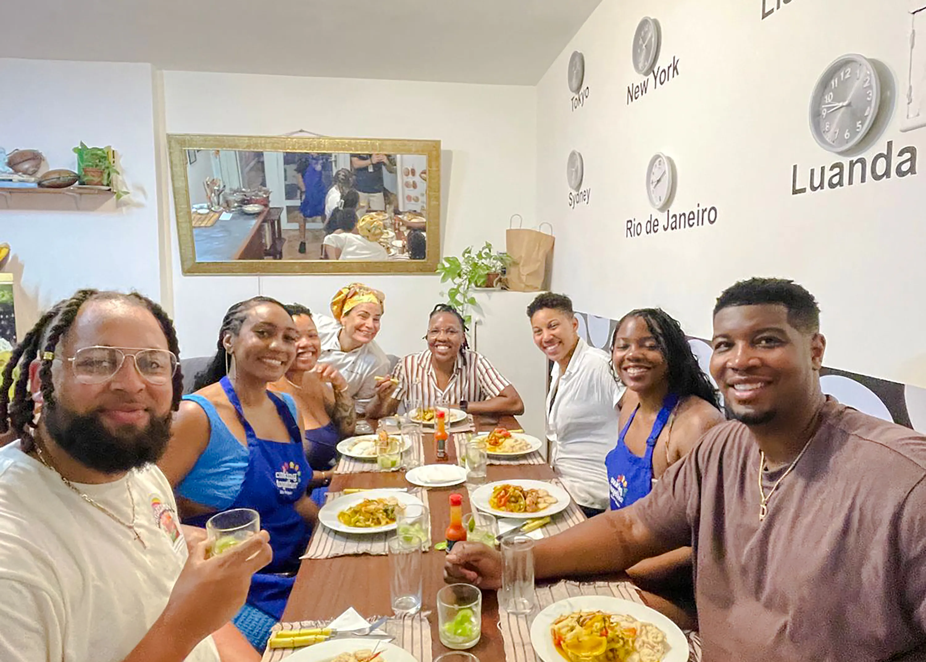 Participants enjoying a Brazilian cooking class meal in Copacabana, Rio de Janeiro.