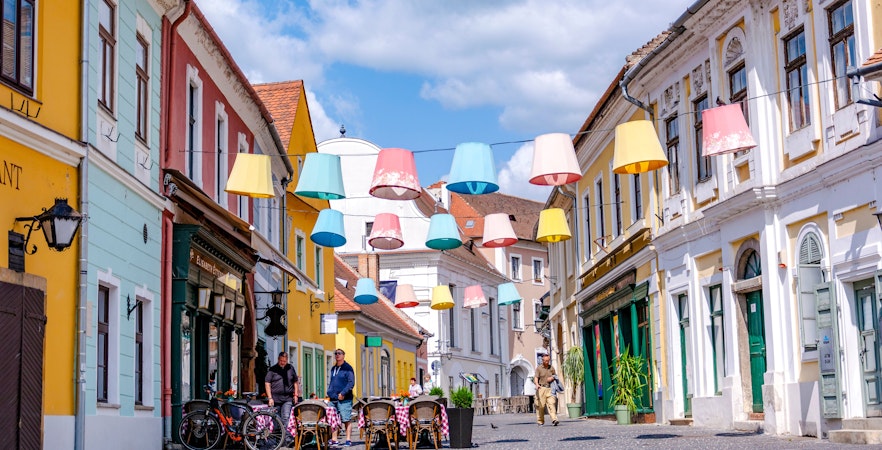 Colorful lampions hanging over a street in the old town of Szentendre, Hungary.