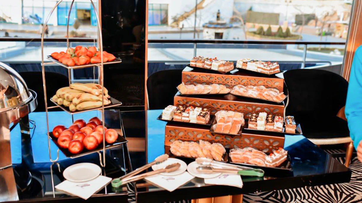 Dessert and fruit buffet on Nile River dinner cruise with pastries and fresh produce.