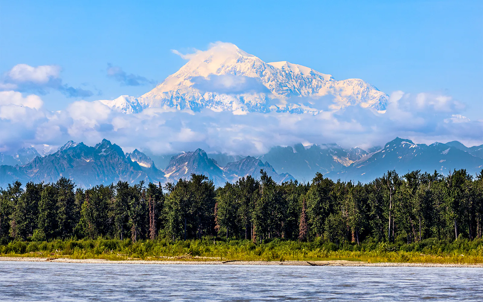 Denali mountain view with forest and river, Alaska Railroad tour.