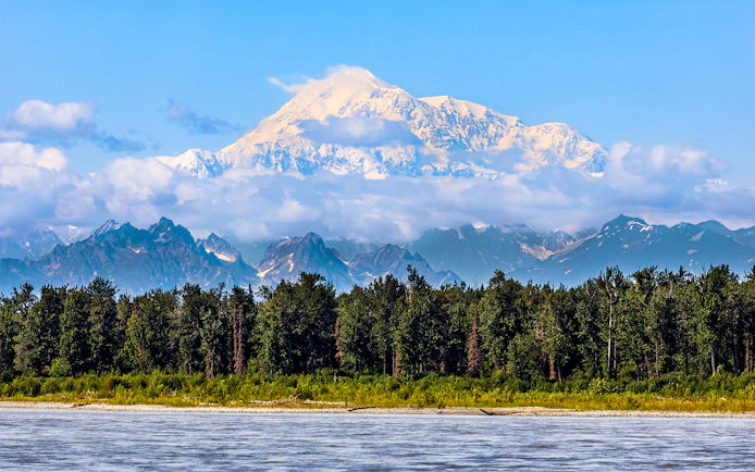 Denali mountain view with forest and river, Alaska Railroad tour.