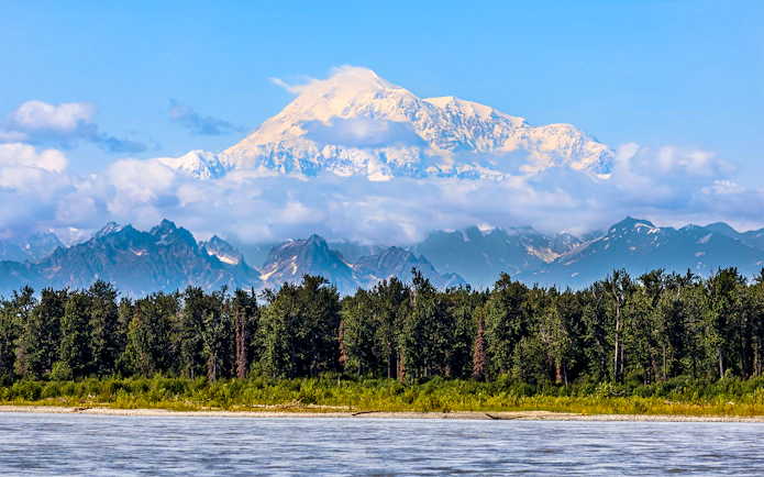 Denali mountain view with forest and river, Alaska Railroad tour.