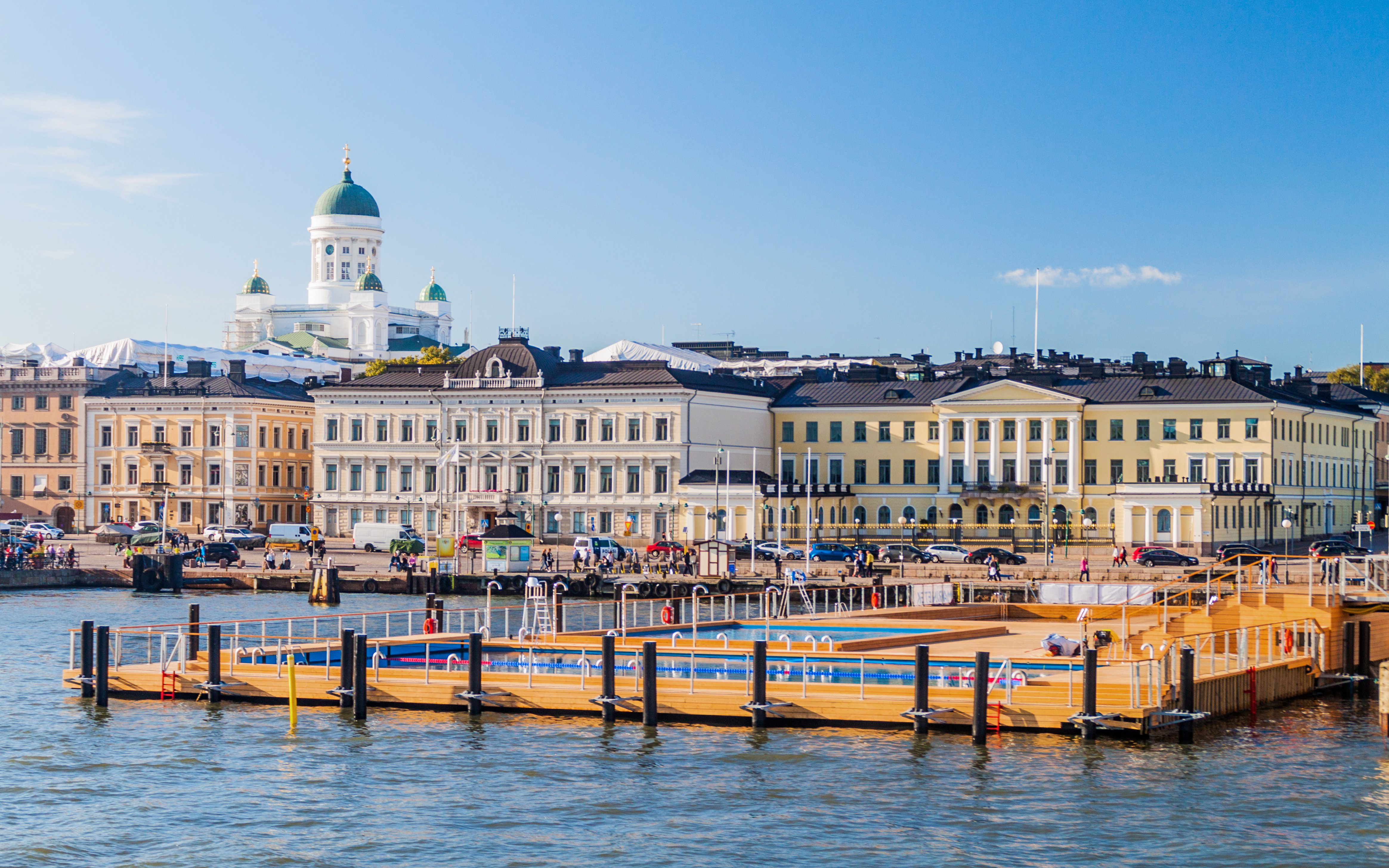 Floating sea spa at Helsinki Pool with Market Square and Helsinki Cathedral in the background.