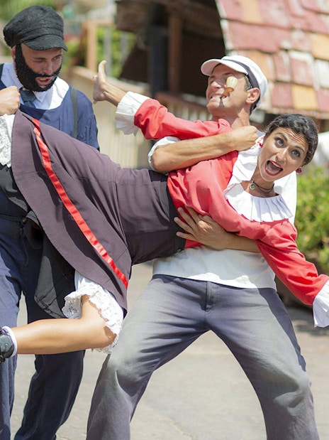 Popeye crew performing a playful scene at Popeye Village, Malta.