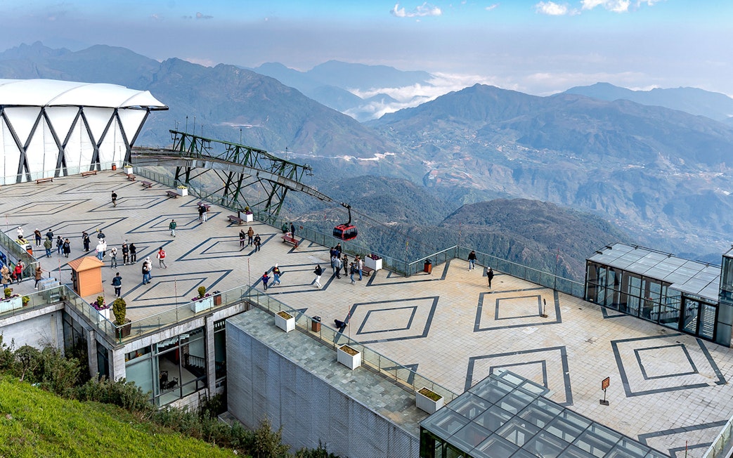 Cable car station at Sun World Fansipan Legend with mountain views in Vietnam.