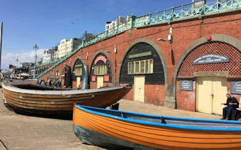 Fishing Quarter Gallery and boats along Brighton seafront, part of the Brighton Highlights Lost Letter game.