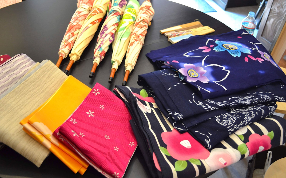 Kimono fabric and parasols for Authentic Kimono Culture Experience in Japan.