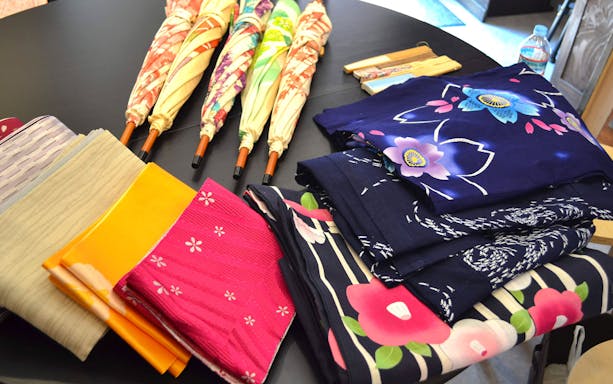 Kimono fabric and parasols for Authentic Kimono Culture Experience in Japan.