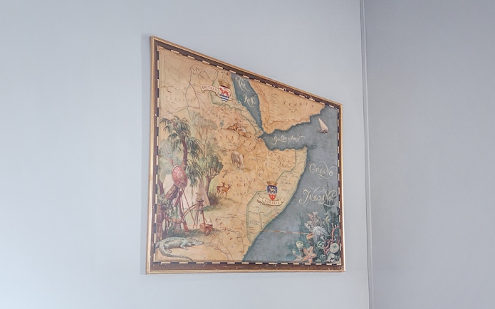 Old Ethiopian map displayed at Miramare Castle, featuring detailed illustrations and geographic labels.