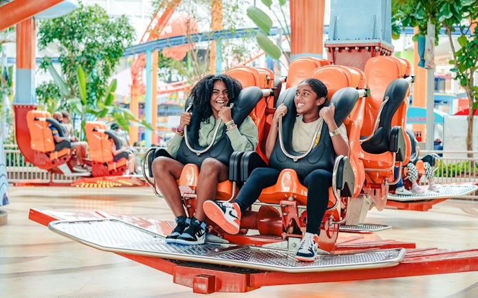 Guests enjoying Aang's Air Gliders ride at American Dream Nickelodeon Universe.