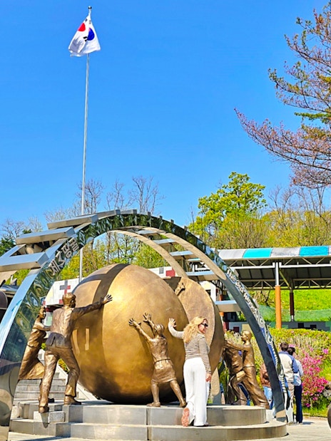 Statues at the DMZ with South Korean flag, part of Seoul to DMZ tour, South Korea.