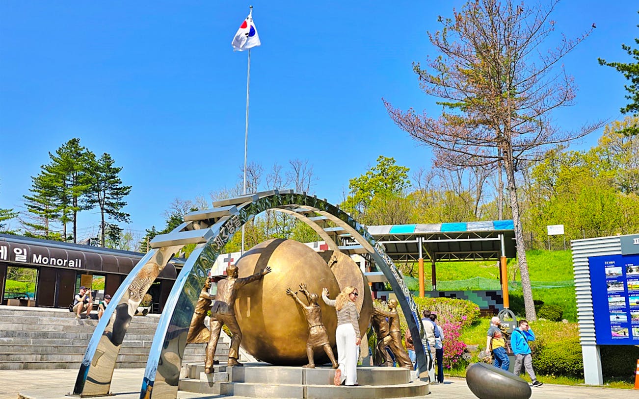 Statues at the DMZ with South Korean flag, part of Seoul to DMZ tour, South Korea.