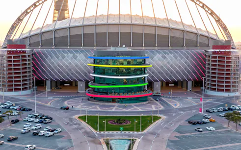 Qatar Olympic And Sports Museum exterior with colorful facade in Doha.