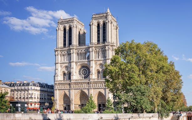 Notre-Dame Cathedral viewed from the Seine River during a sightseeing cruise in Paris.