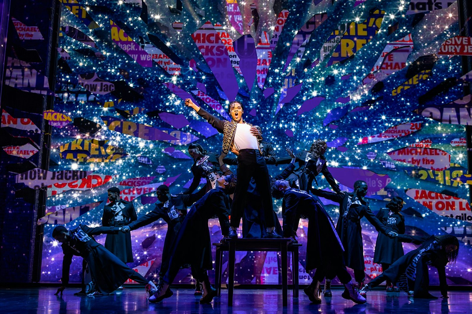 Stage performance of MJ the Musical in Brisbane with dancers and vibrant backdrop.