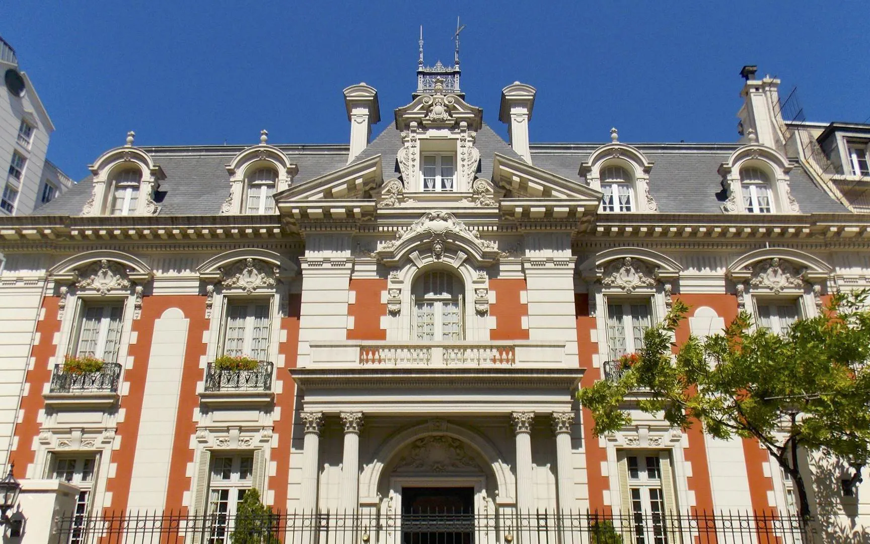 Palacio Álzaga Unzué facade in Buenos Aires, Argentina, showcasing ornate architectural details.