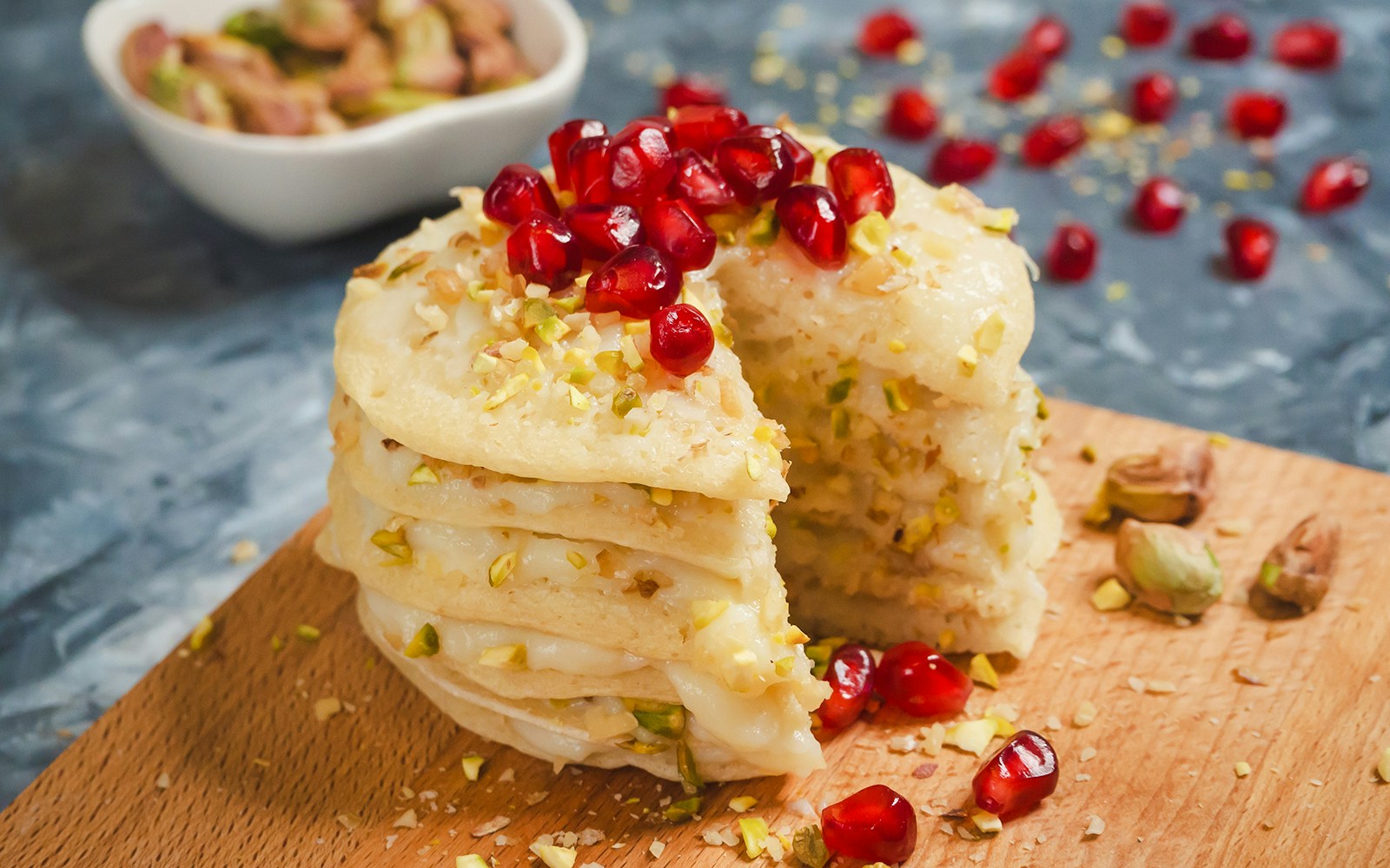 Moroccan dessert with pomegranate and pistachios served at Jawhara dinner show in Marrakech.