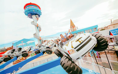 Visitors enjoying a ride at Adventure Bay, The Land of Legends theme park.