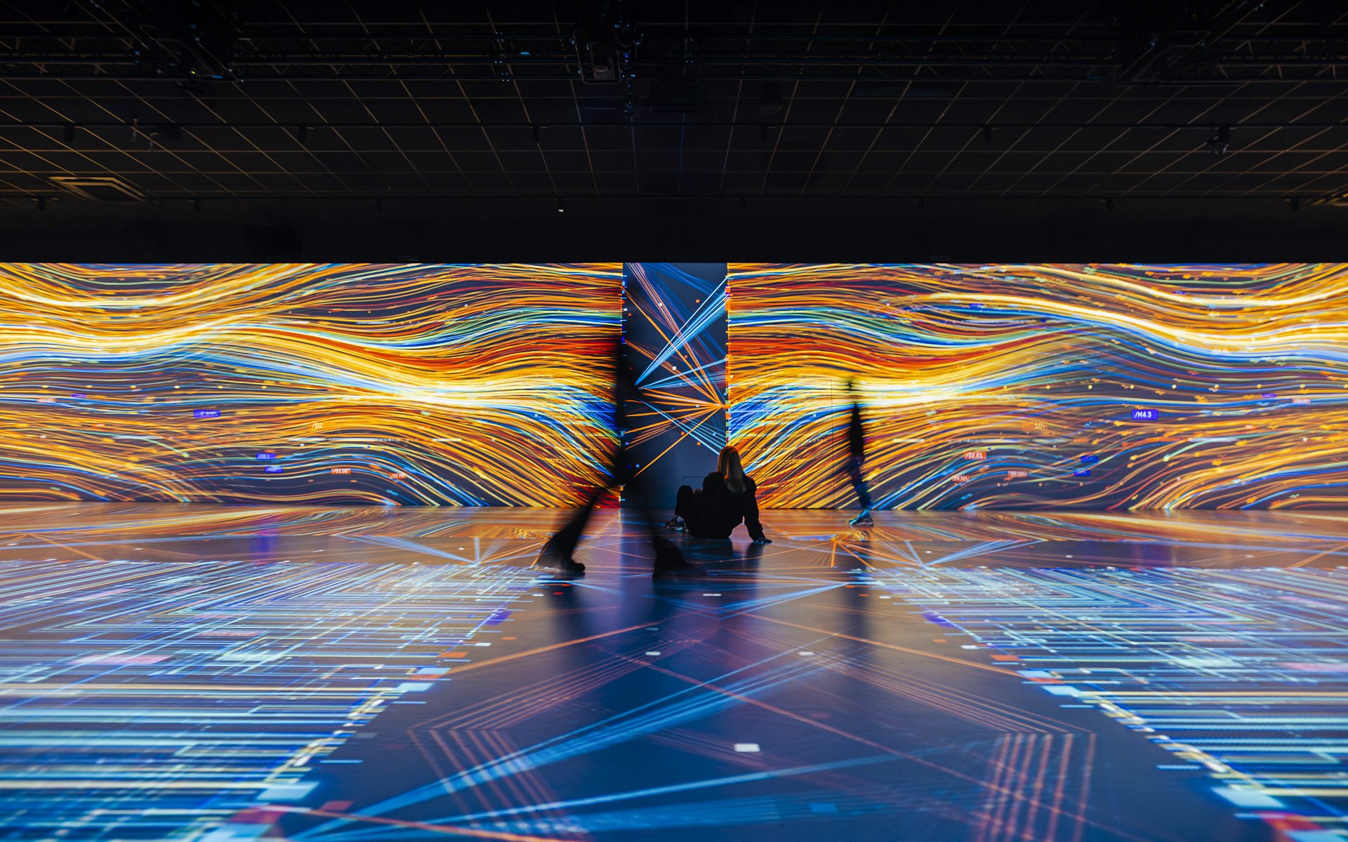 Guests viewing digital art displays at Signal Space Digital Art Gallery.