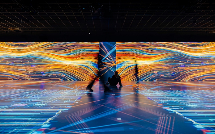 Guests viewing digital art displays at Signal Space Digital Art Gallery.