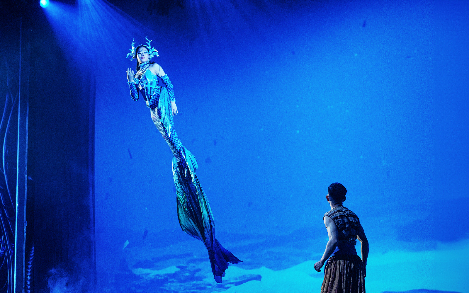 Mermaid performer in Varuna Underwater Theatrical Dining Experience.