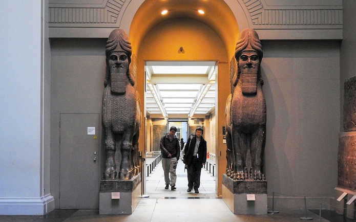British Museum entrance with Assyrian lamassu statues, London guided tour.