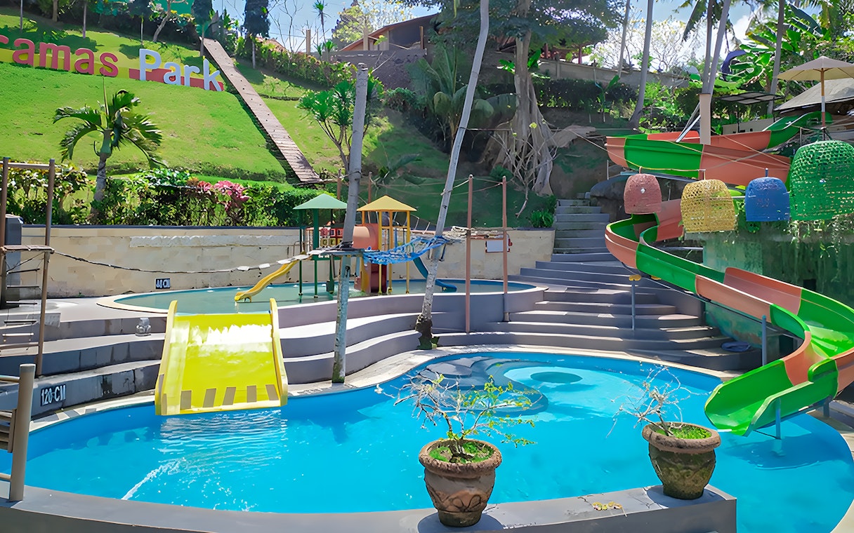 Keramas Park water slides and play area with colorful structures.
