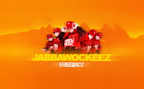 Jabbawockeez dancers in red outfits and masks, Vegas show promotion.