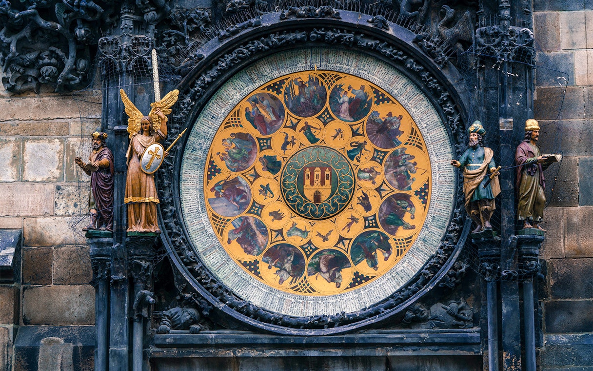 Prague Astronomical Clock with detailed zodiac signs and statues.